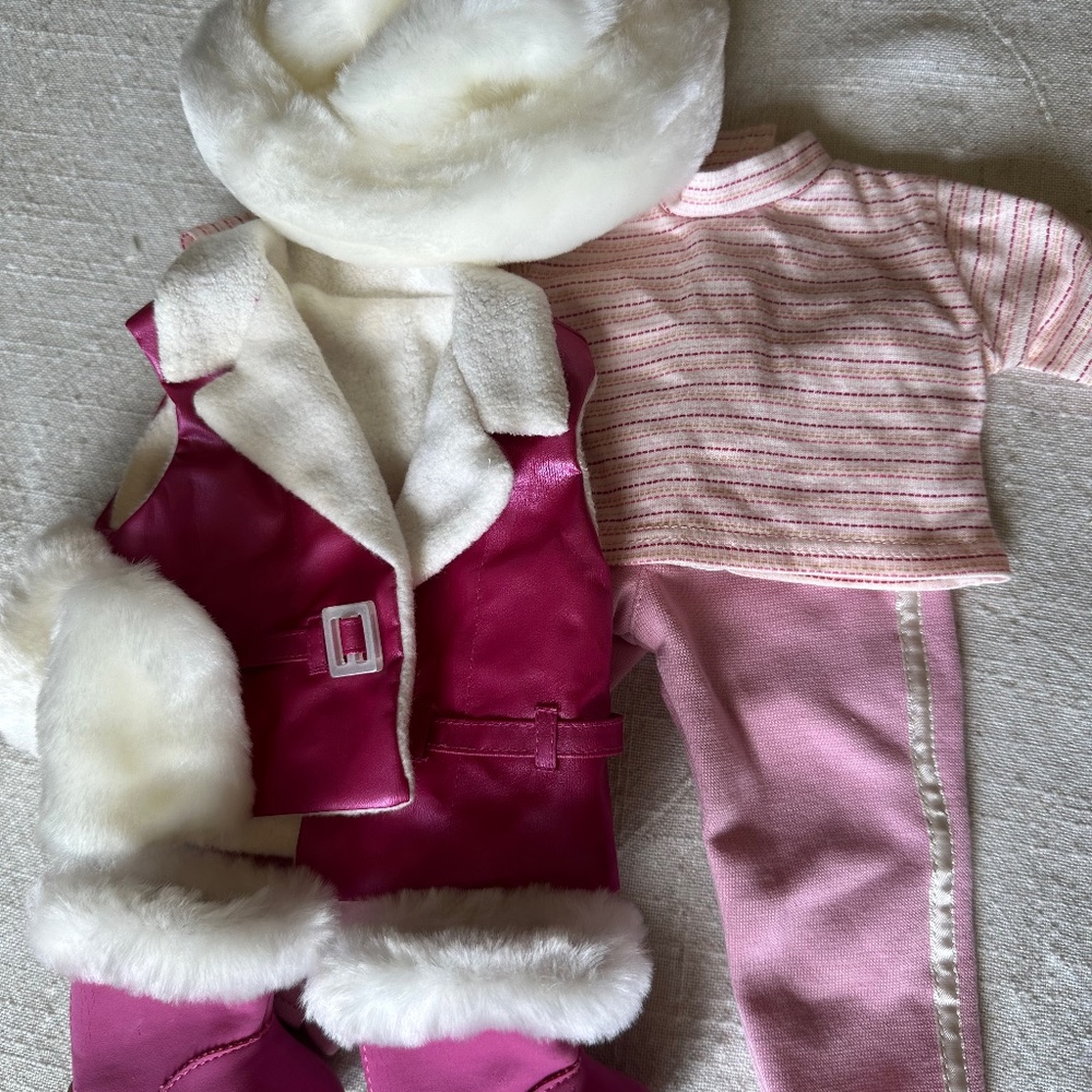 American Girl. Bundle of  several NEW CONDITION oufits!